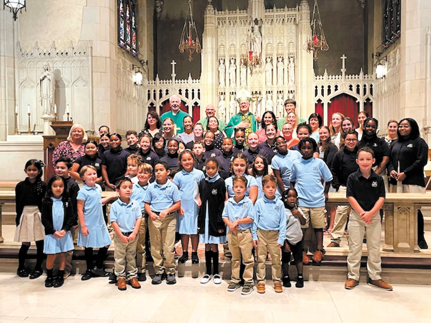 CELEBRATING THE 100TH: St. Paul School held a special mass with Bishop Thomas Tobin on Sept. 18 which many of the school’s students attended. (Submitted photo)